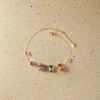 A golden chain bracelet set with multi-colored gemstones, a light luxury and fashionable ladies' jewelry details Picture
